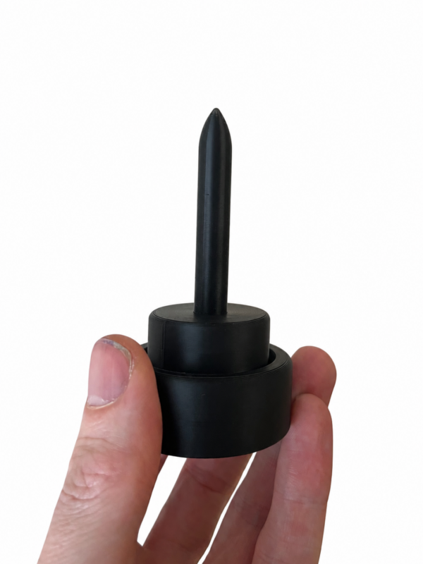 Mini-Mini Wollabroller im Größenvergleich Schwarzer Mini-Mini Wollabroller aus dem 3D-Drucker in einer Hand